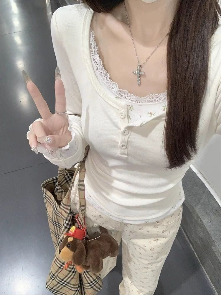 Top de dos piezas con costuras de encaje floral, manga larga, corte entallado y aspecto entallado