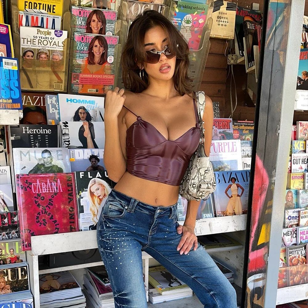 Correa de pecho elástica brillante de PU con correa trasera irregular para mujer